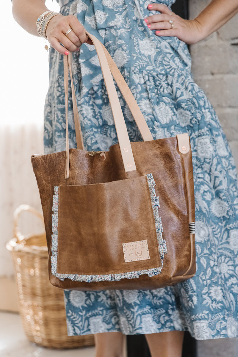 Leather tote with online outside pockets